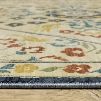 3' X 5' Ivory Blue And Burnt Orange Oriental Area Rug With Fringe