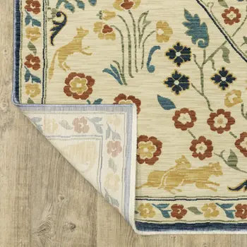 3' X 5' Ivory Blue And Burnt Orange Oriental Area Rug With Fringe