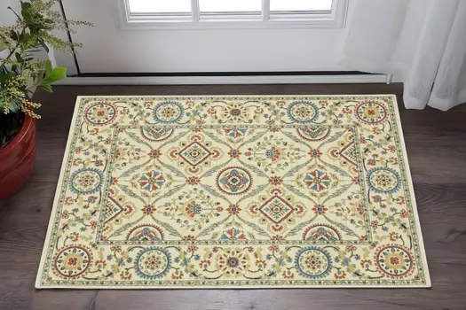 3' X 5' Ivory Blue And Burnt Orange Oriental Area Rug With Fringe