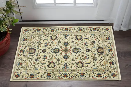 3' X 5' Ivory Blue And Brown Oriental Area Rug With Fringe