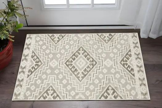 3' X 5' Beige And Brown Tribal Area Rug