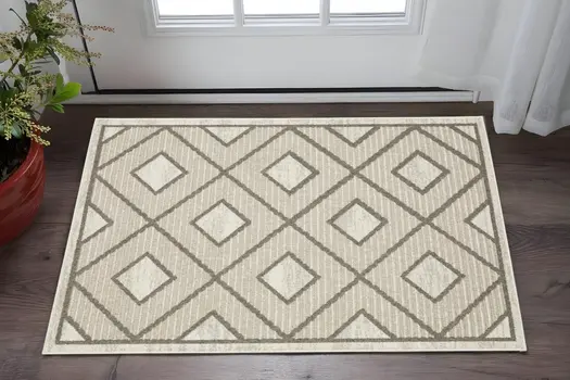 3' X 5' Beige And Brown Geometric Area Rug