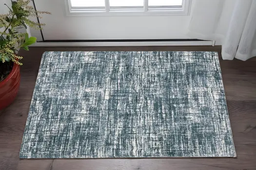 2' X 3' Teal And Ivory Geometric Area Rug