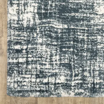 2' X 3' Teal And Ivory Geometric Area Rug