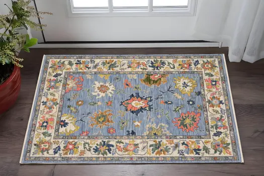 3' X 5' Blue Yellow And Ivory Oriental Area Rug With Fringe