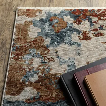 3' X 5' Beige Teal And Rust Abstract Area Rug With Fringe