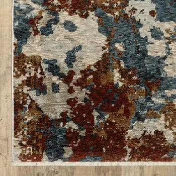 3' X 5' Beige Teal And Rust Abstract Area Rug With Fringe
