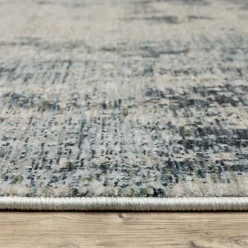 3' X 5' Beige And Blue Abstract Area Rug With Fringe
