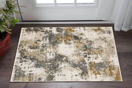 3' X 5' Beige And Gray Abstract Area Rug With Fringe