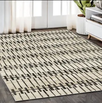 5' X 8' Beige And Black Geometric Area Rug