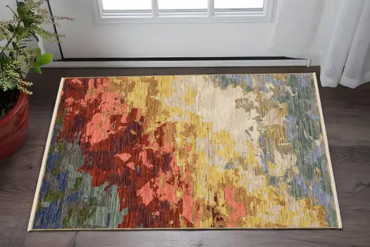 3' X 5' Beige Rust And Yellow Abstract Area Rug With Fringe