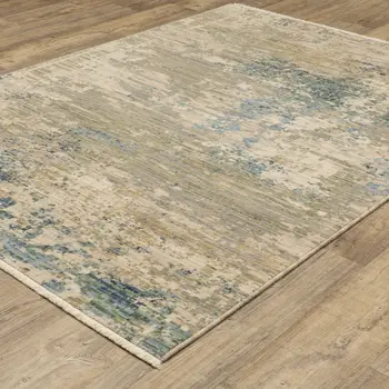 3' X 5' Beige And Blue Abstract Area Rug With Fringe