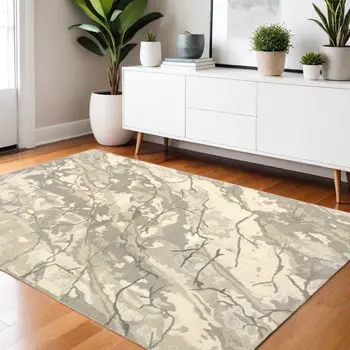 4' X 6' Beige And Ivory Wool Abstract Hand Tufted Area Rug