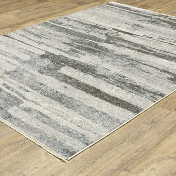 5' X 8' Gray And Ivory Abstract Area Rug With Fringe