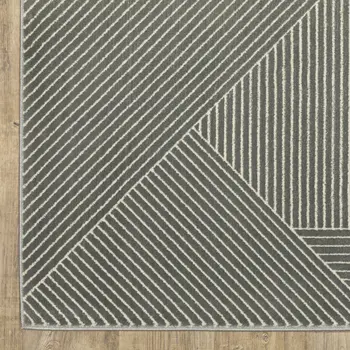 7' X 10' Gray And Ivory Geometric Area Rug