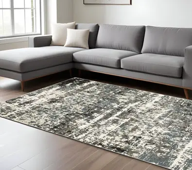 7' X 10' Ivory And Gray Abstract Area Rug