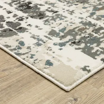 7' X 10' Ivory And Gray Abstract Area Rug