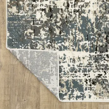 7' X 10' Ivory And Gray Abstract Area Rug