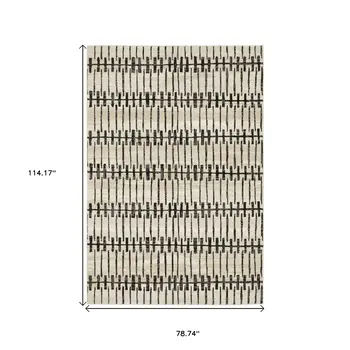 7' X 10' Beige And Black Geometric Area Rug