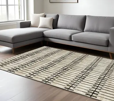 7' X 10' Beige And Black Geometric Area Rug