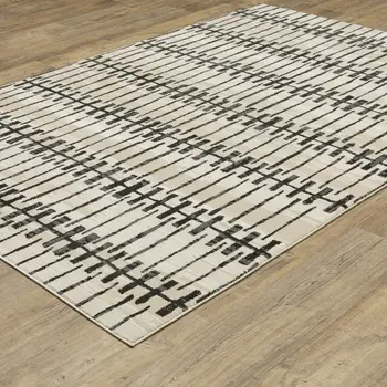 7' X 10' Beige And Black Geometric Area Rug