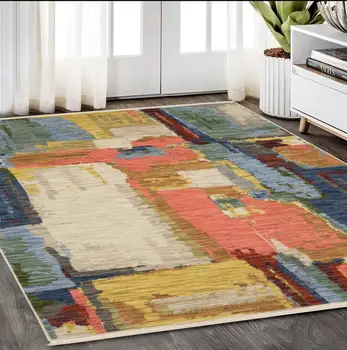 5' X 8' Beige Yellow And Salmon Abstract Area Rug With Fringe