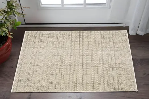 3' X 5' Beige And Brown Geometric Area Rug With Fringe