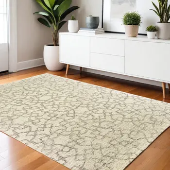 4' X 6' Tan And Ivory Wool Geometric Hand Tufted Area Rug