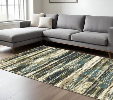 7' X 10' Beige And Blue Abstract Area Rug