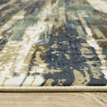 7' X 10' Beige And Blue Abstract Area Rug