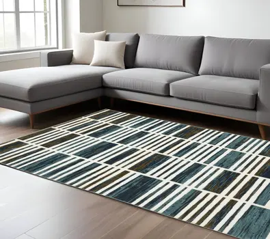 7' X 10' Ivory And Blue Geometric Area Rug