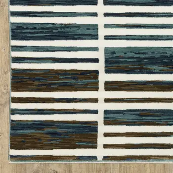 7' X 10' Ivory And Blue Geometric Area Rug