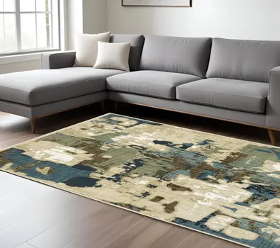 7' X 10' Beige Brown And Blue Abstract Area Rug
