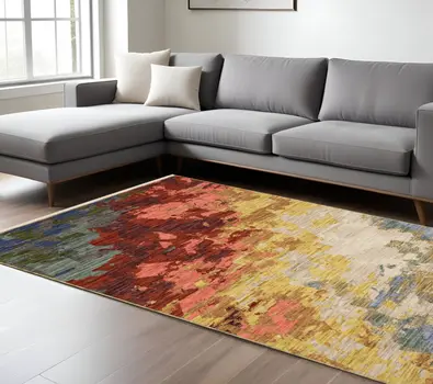 7' X 10' Beige Salmon And Yellow Abstract Area Rug With Fringe
