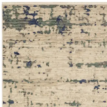7' X 10' Beige And Green Abstract Area Rug With Fringe