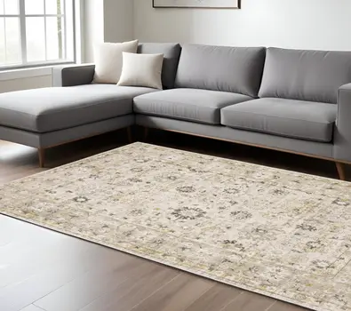 6' X 9' Beige And Gold Oriental Hand Tufted Area Rug