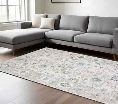 6' X 9' Ivory And Teal Blue Oriental Hand Tufted Area Rug