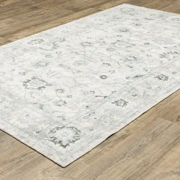 6' X 9' Ivory And Teal Blue Oriental Hand Tufted Area Rug