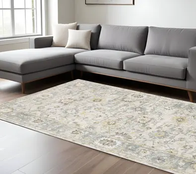 6' X 9' Ivory And Blue Oriental Hand Tufted Area Rug