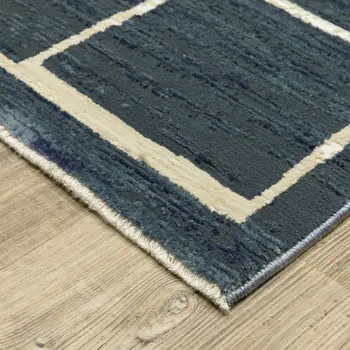 8' X 11' Blue And Ivory Geometric Area Rug