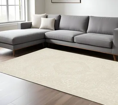8' X 11' Ivory And Beige Medallion Area Rug