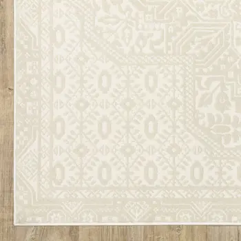 8' X 11' Ivory And Beige Medallion Area Rug