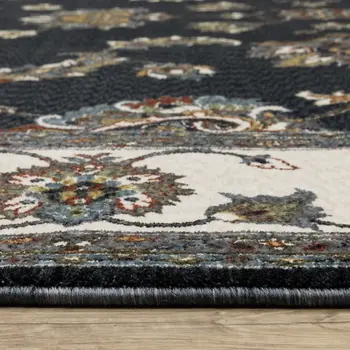 7' X 10' Navy Blue And Ivory Oriental Area Rug With Fringe