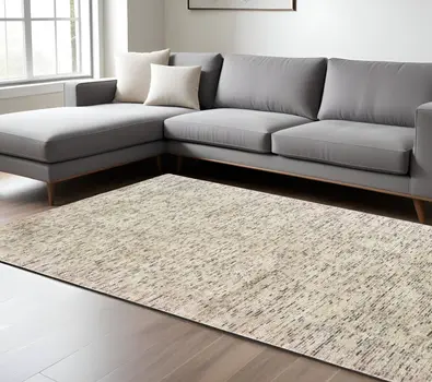 8' X 10' Ivory Hand Tufted Area Rug