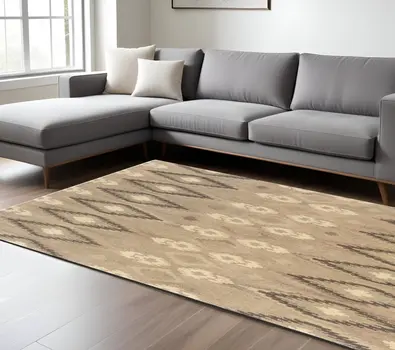 8' X 10' Beige And Ivory Wool Abstract Hand Tufted Area Rug