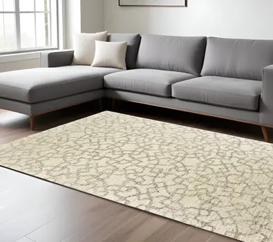 8' X 10' Tan And Ivory Wool Geometric Hand Tufted Area Rug