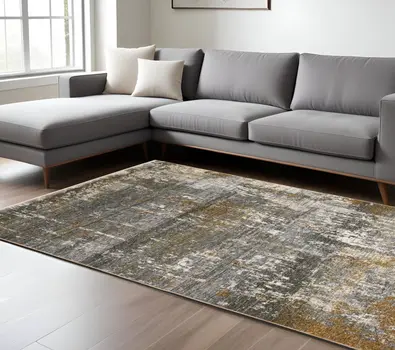 10' X 13' Gray And Gold Abstract Area Rug With Fringe