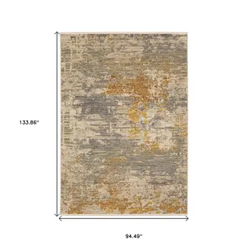 8' X 11' Beige And Gold Abstract Area Rug With Fringe