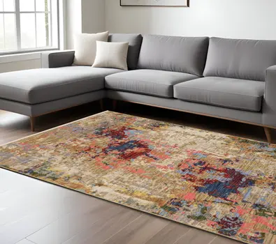 8' X 11' Beige Salmon And Tan Abstract Area Rug With Fringe