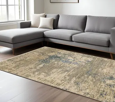 8' X 11' Beige And Blue Abstract Area Rug With Fringe